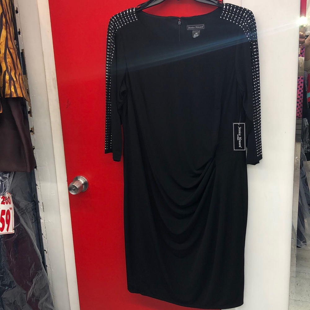 Black dress with shoulder design
